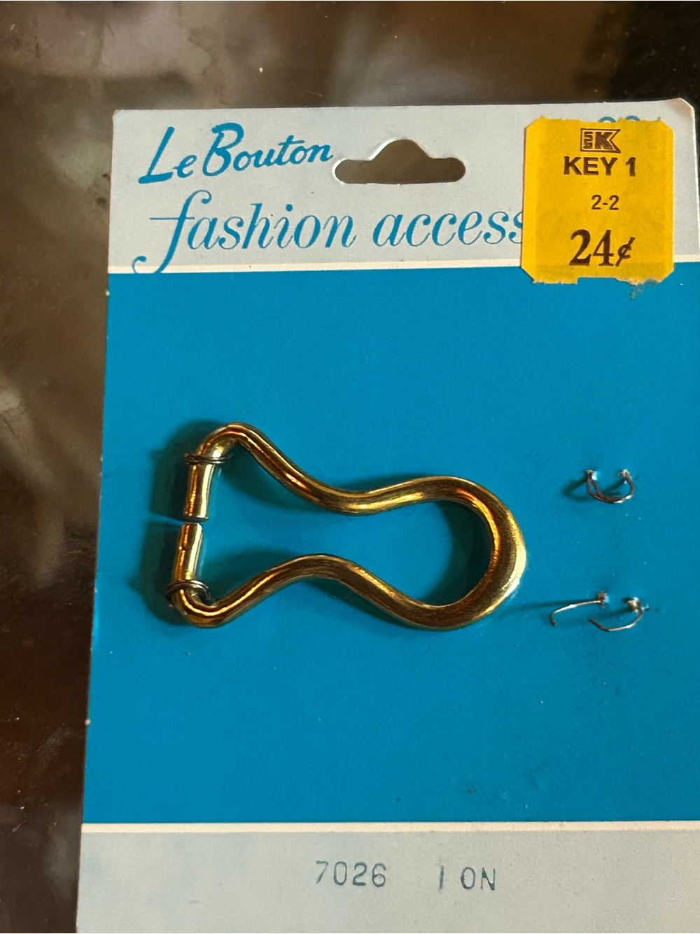 vintage Le Bouton brass-colored fashion hook and eye closure set
